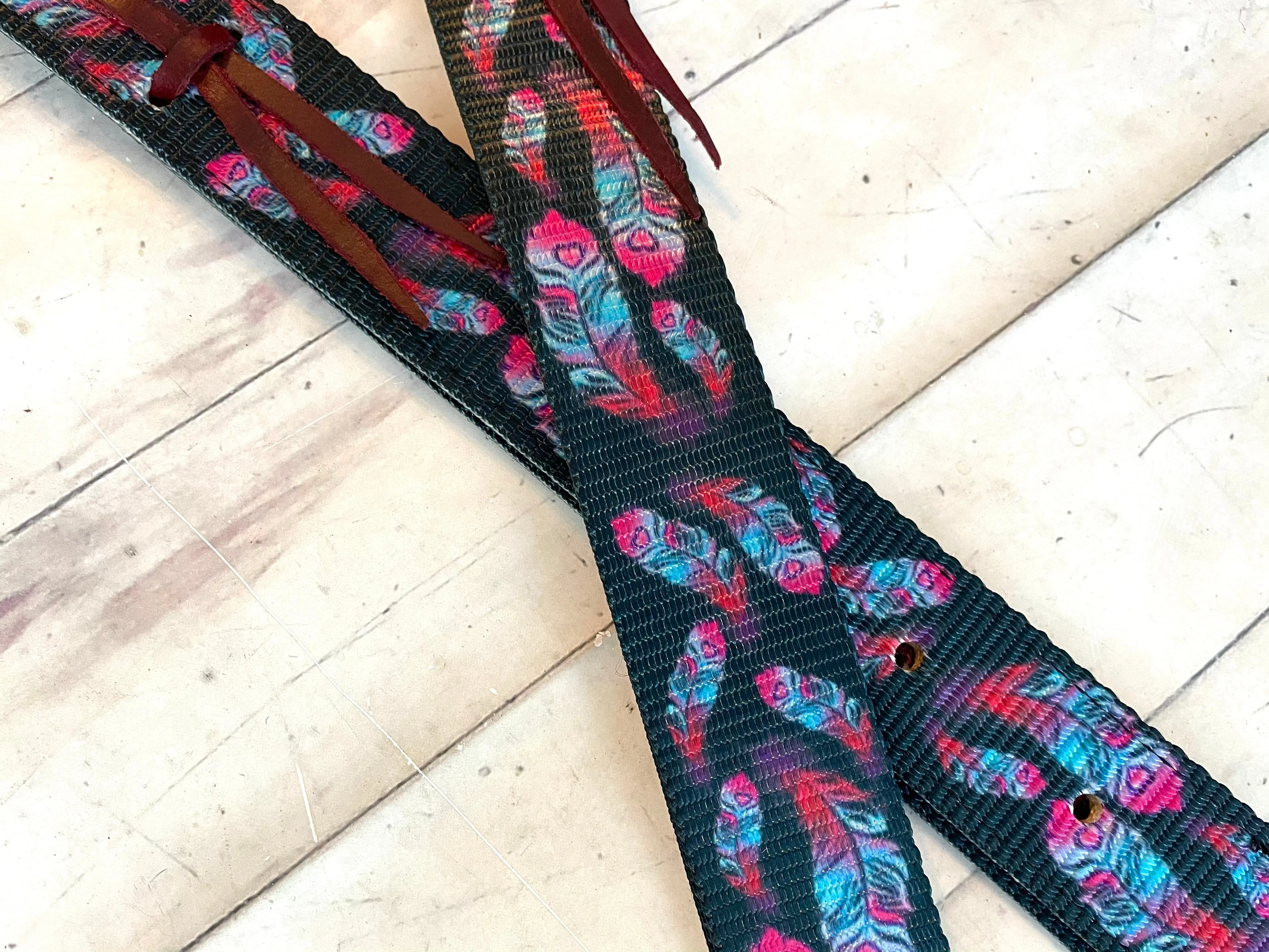 Multi Colored Feather on Black Background Cinch Strap Set